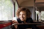 Artistic Denture Design - Lady Smiling on Bus