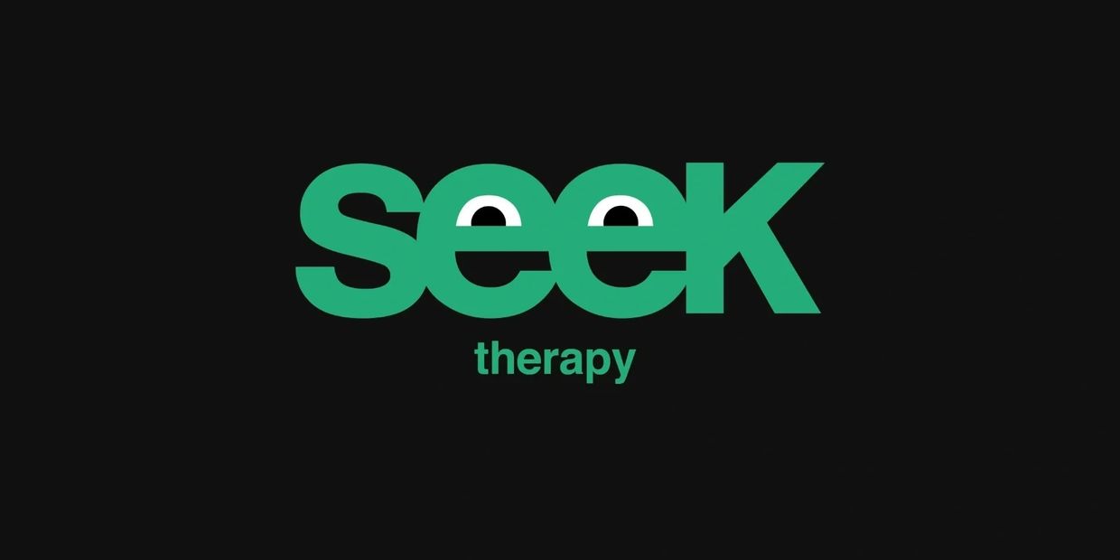 Green Seek Therapy logo with eyes looking against a black background.