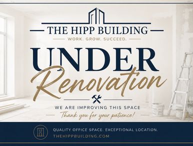 Sign announcing renovation at The Hipp Building office space.