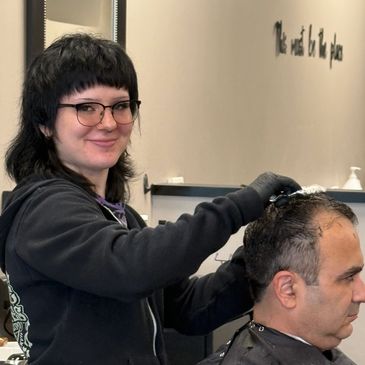 Sam doing a scissor cut