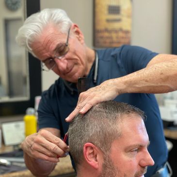 Stuart doing a clipper cut haircut