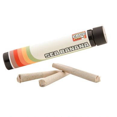 Three rolled joints with Sea Banana labeled container.