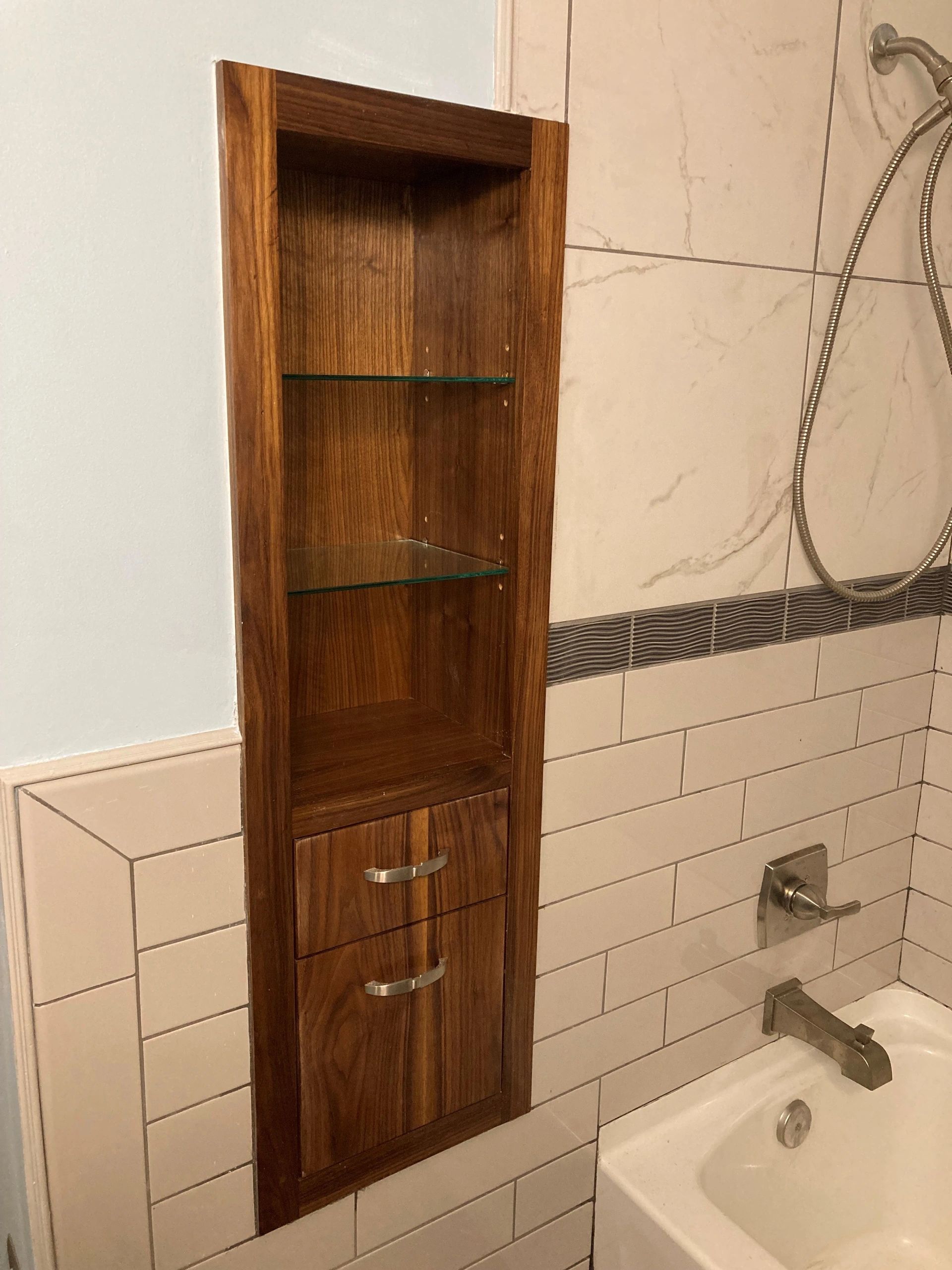 Built-in Walnut Cabinet that Utilizes the empty space of a Chase. Not Grain Match on Drowers.
