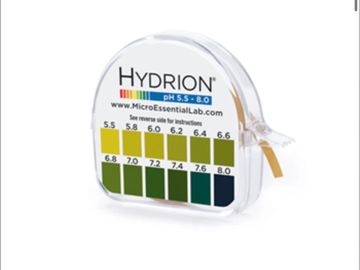 Hydrion pH paper dispenser measuring pH from 5.5 to 8.0.