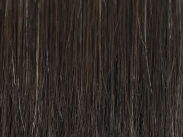 Close-up dark brown hair strands.