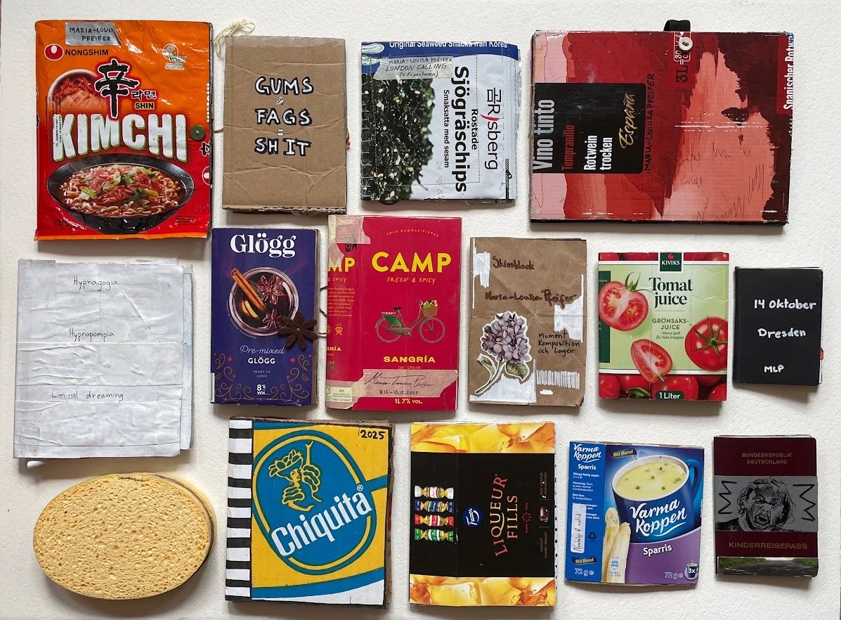 Artisan book covers made from repurposed food and beverage packaging.