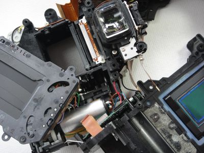 Digital Camera Repair  - items shown
(shutter, mirror box and sensor assemblies)