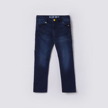 Dark blue denim jeans for kids with a yellow button and brand label.