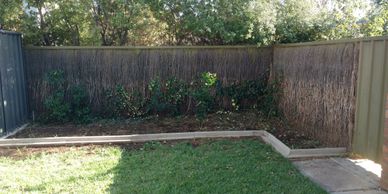 Brush repack to the top portion of the fence
