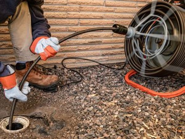 A rootering machine for cleaning septic lines.