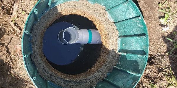 A septic system pipe and riser.