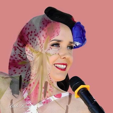 A woman smiling with a microphone, overlaid with a pink floral pattern.