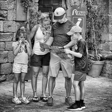 Family Group Lost in Tuscany, map reading