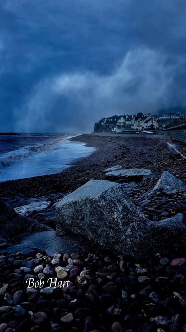 Stormy blue day on Sidmouth Beach in Devon, UK