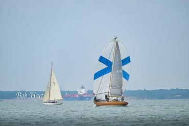 Volonté, a classic 37-foot Sparkman & Stephens racing yacht chasing Lalerne, a 30-foot wooden day ra