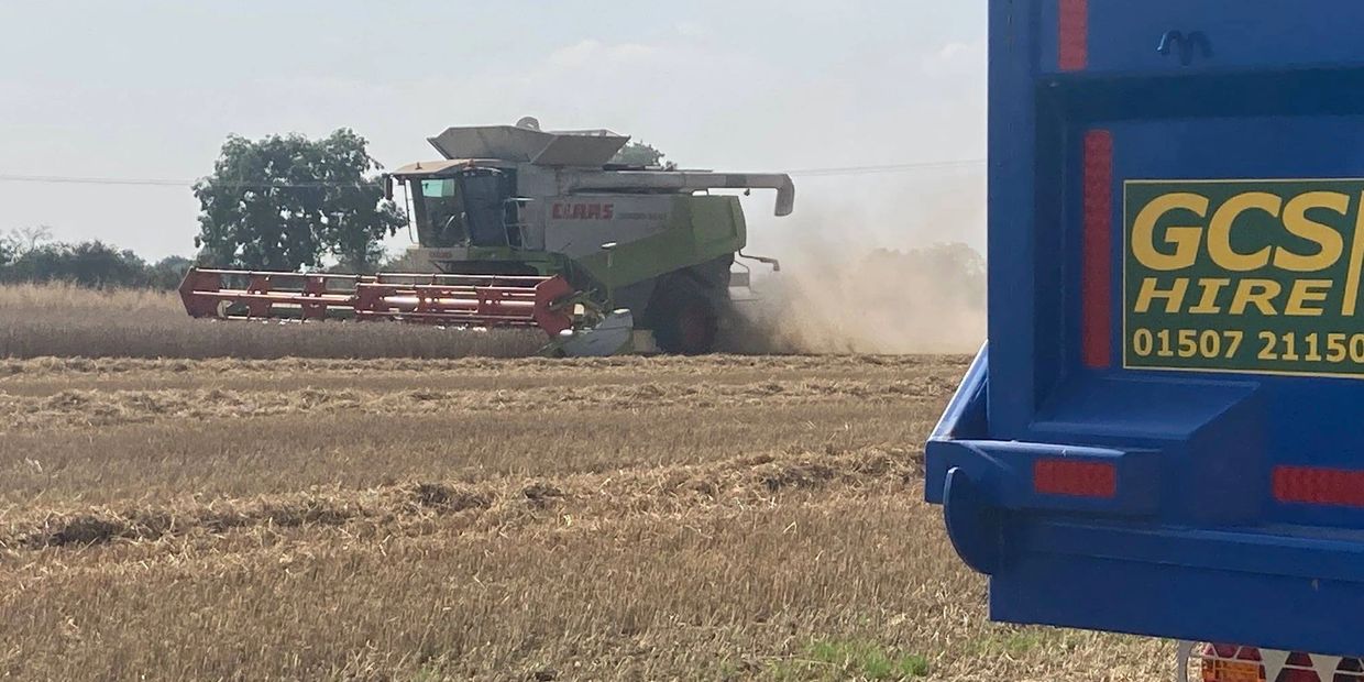 combine harvester with GCS Group hire tractor.