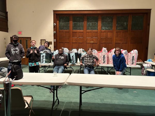 Helping the Missions Comittee put together Senior Citezen Bags!