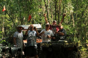 happy men and atvs