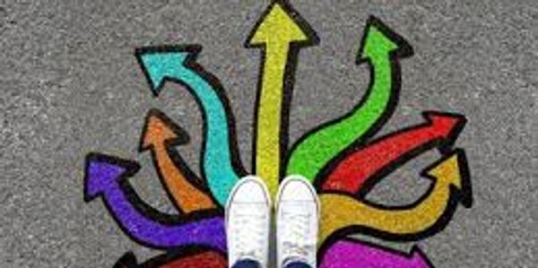 image of two feet over rainbow arrows 