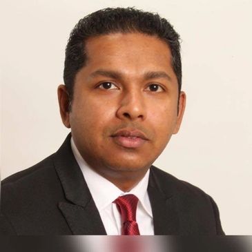 Professional man in suit and red tie.