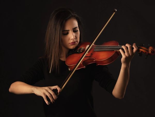 A woman playing violin