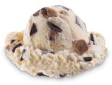 Cookie Dough Pieces and Chocolate Chips blending in Cookie Dough flavored Ice Cream