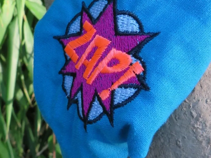 Close up of machine embroidered headband