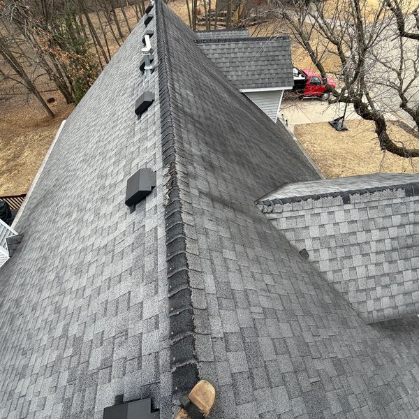 Old residential roof inspected by D&B Roofing during a free roof inspection and later replaced with a new Class 4 impact-resistant roofing system for stronger protection against hail and severe Midwest weather in the Quad Cities.