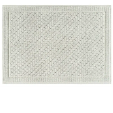Rectangular white textured rug with subtle pattern and border.