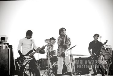 Sin 34 playing on Santa Monica Pier, November 1982.