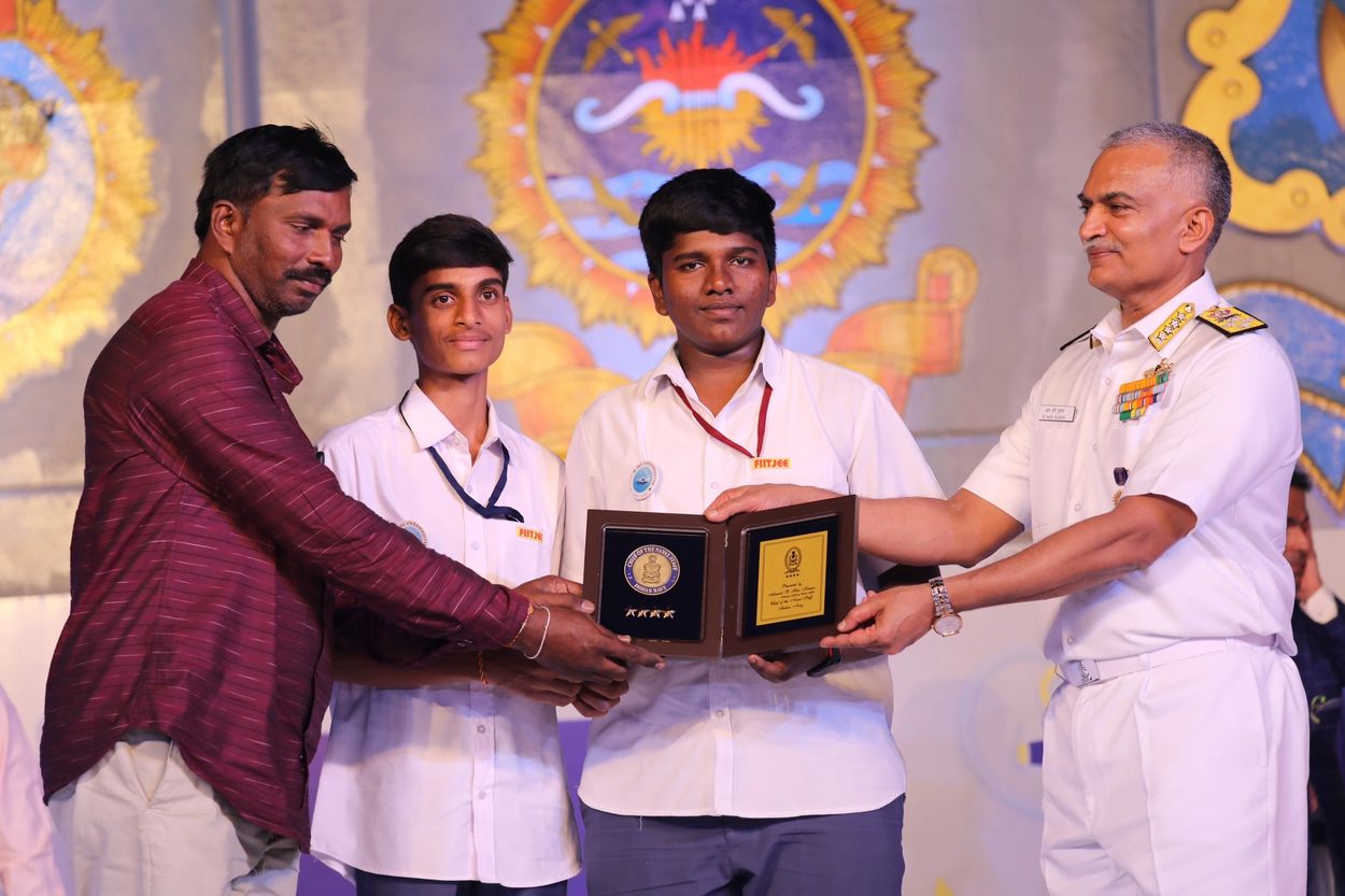 Receiving the Indian Naval Crest for Indian naval Cheif admiral R Hari kumar .