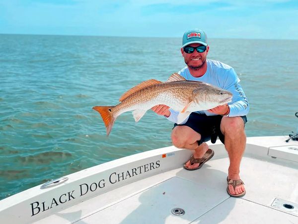 Capt Adam Shields Captain Black Dog Charters redfish red fish fishing charters ranger boats