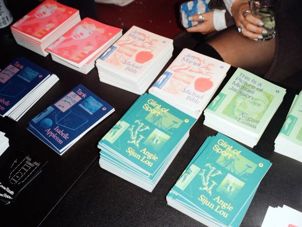 Stacks of colorful brochures on a table.