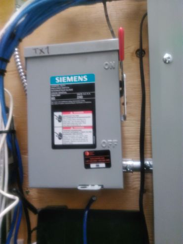 Transformer disconnector in commercial building installatiion.