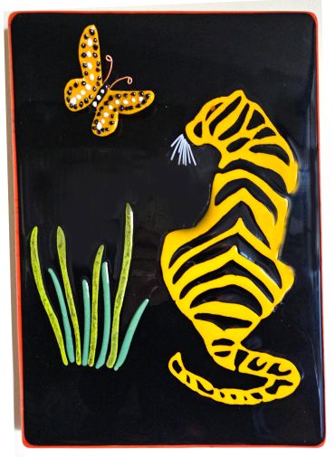 Tiger and butterfly art on black background.