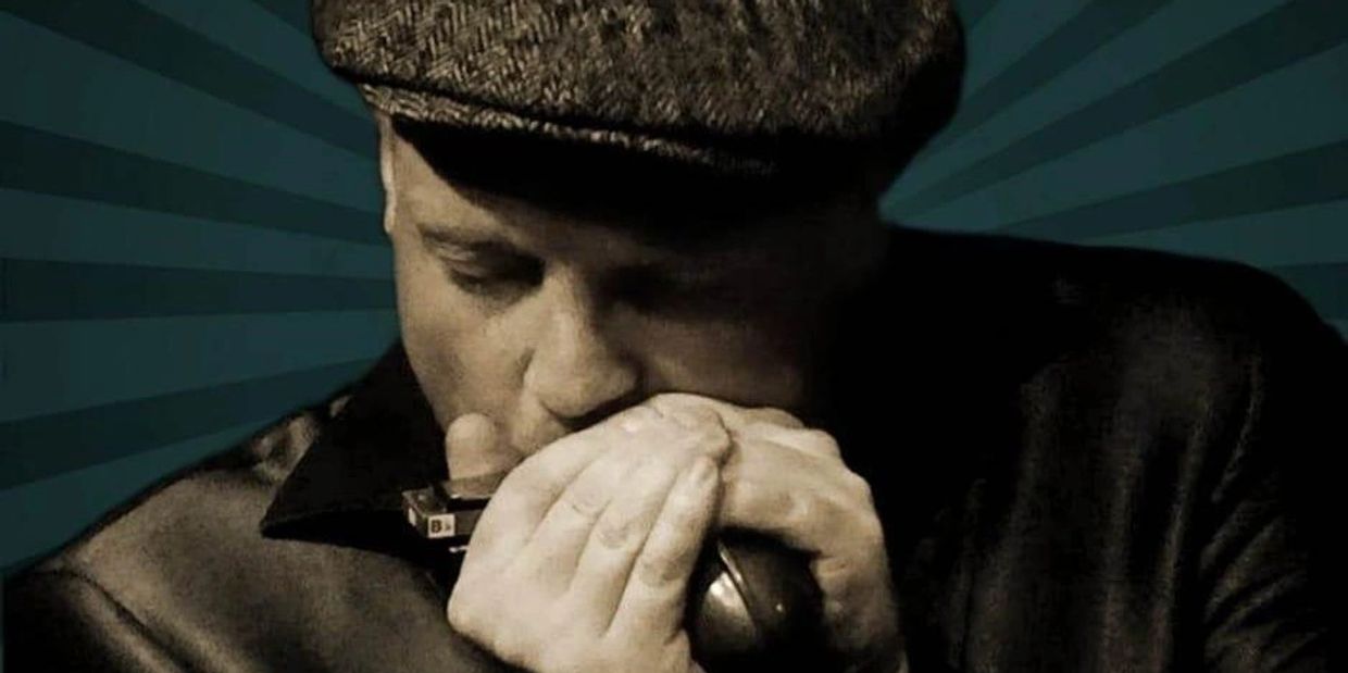 JD delivers "big-tone" Blues harmonica sound, reminiscent of Little Walter and Big Walter Horton.