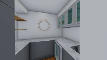 Modern kitchenette with grey cabinets and marble countertops.