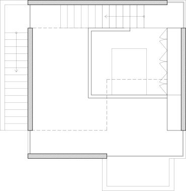 Architectural floor plan showing staircases and room layout with doors.