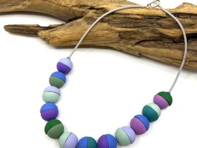 Colorful round beads on a string.
