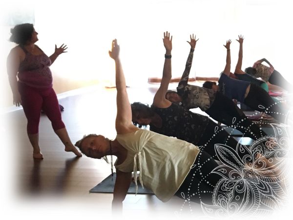 Cheryl Walters teaching a public yoga class