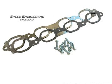A metal gasket with screws for automotive use.