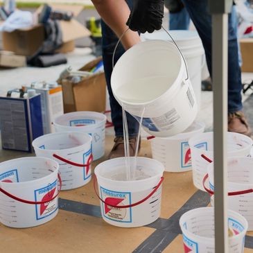 buckets of project of concrete epoxy floor coatings