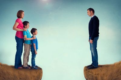 Family separated by a gap, facing each other.