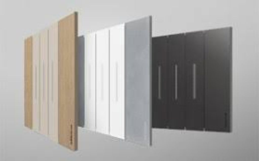 Various wooden and painted cabinet doors displayed in a row.
