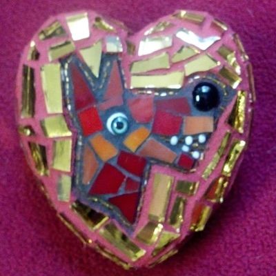 Mosaic dog heart. Foam, mesh, concrete, stained glass, glass beads, plastic, mortar.