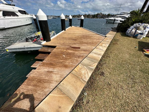 Sea wall repairs. Seawall capping stone. 