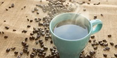 Image of Cup of coffee an coffee beans