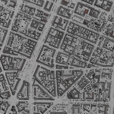 Detailed aerial view of a historic city layout with marked buildings.