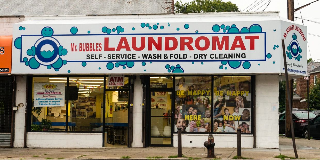 Exterior of East Elmhurst's Mr. Bubbles Laundromat storefront located at 9423 Astoria Boulevard.