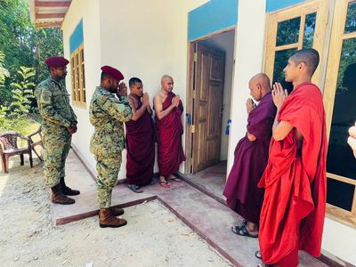 Bhante Kusala opening a house he coordinated to raise funds for with Sri Lankan Army